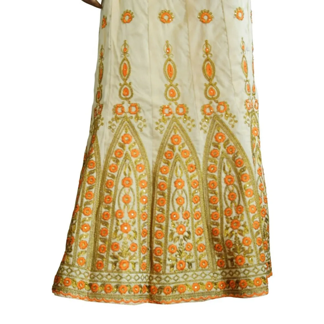 Beige Embroidered lehenga with orange or pink embroidery and contrast duppatta